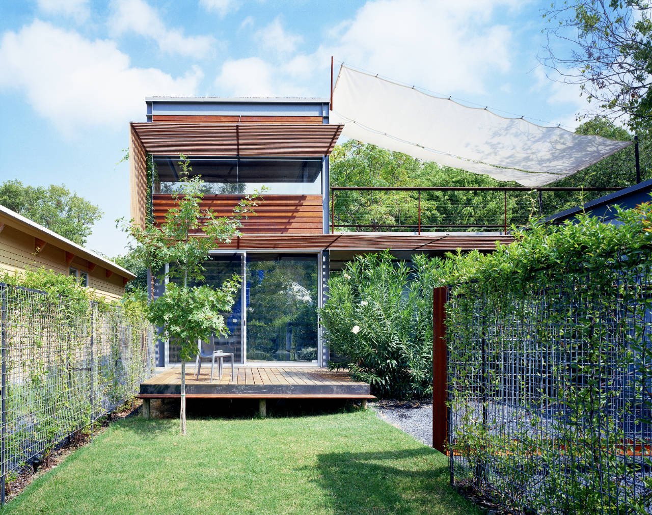Green architecture with limpid glass interior